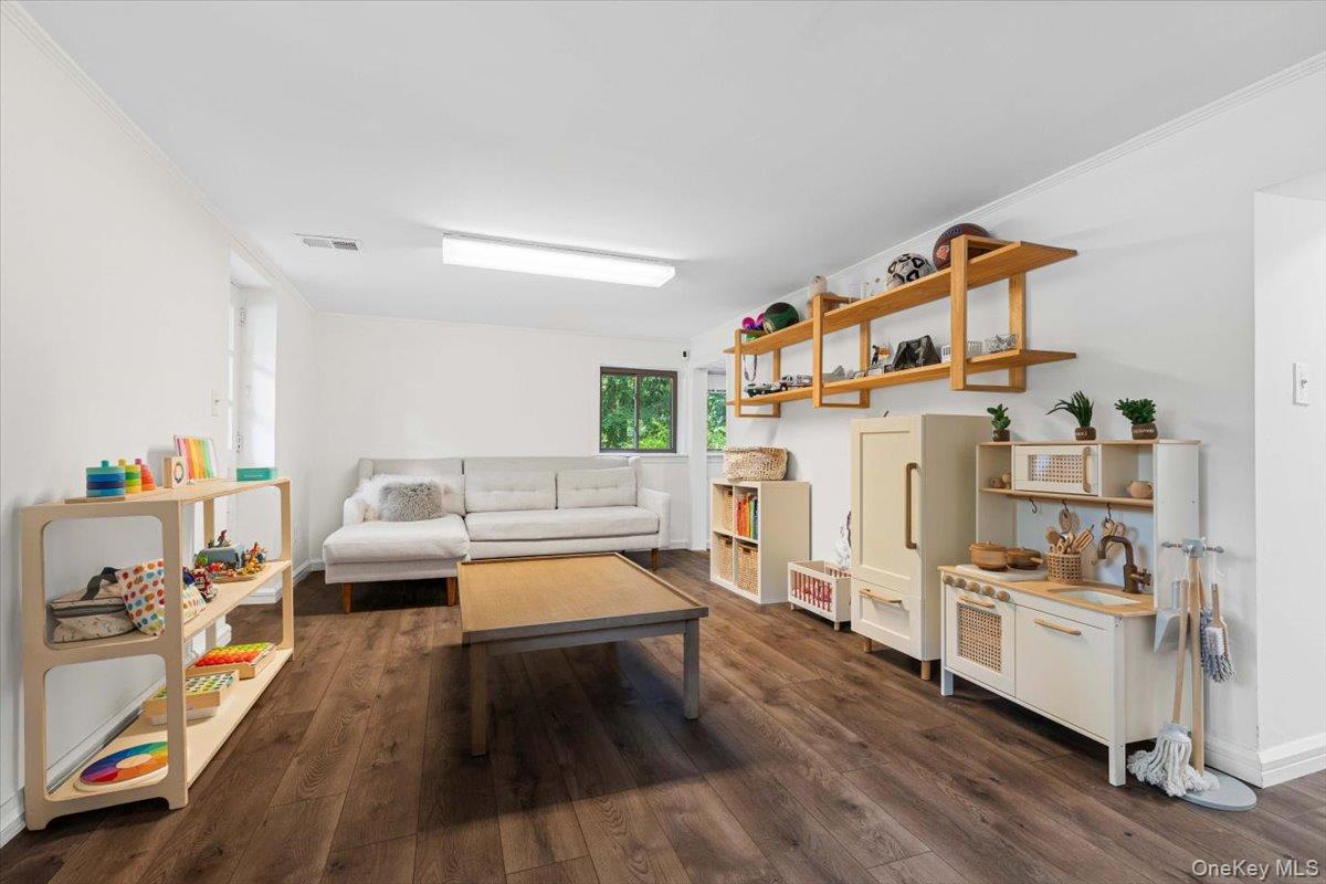 43 Winslow Road White Plains, NY 10606 - Photo 21 of 32 a living room with furniture and a wooden floor