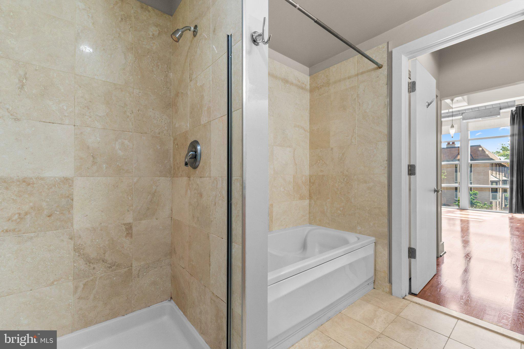 1320 13th Street Northwest, Unit 21 Washington, DC 20005 - Photo 32 of 41 Primary Bathroom- Separate Bath and Shower