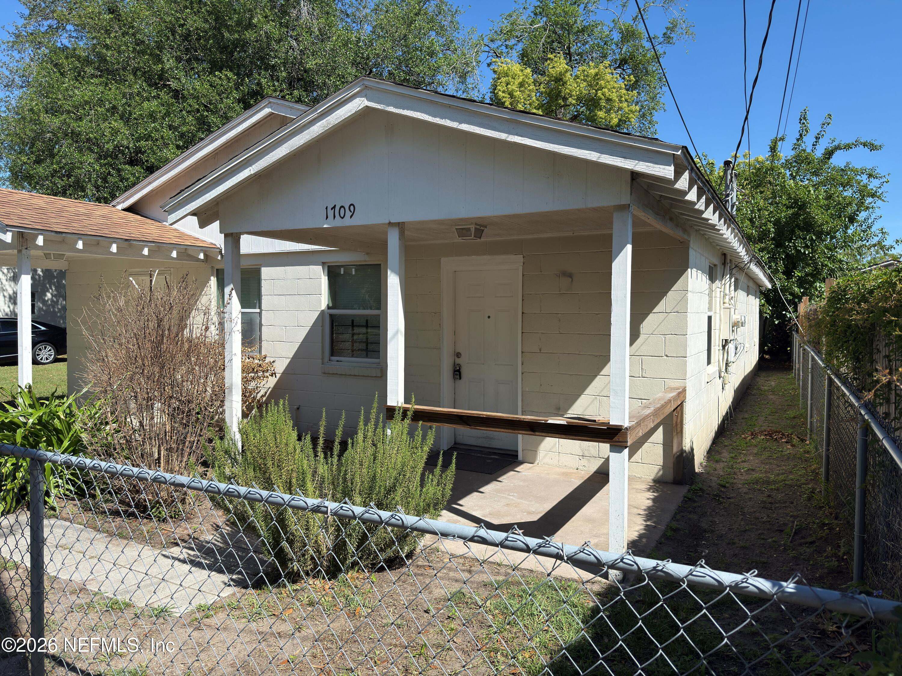 1709 Dot Street Jacksonville, FL 32209 - Photo 17 of 17 a front view of a house with garden