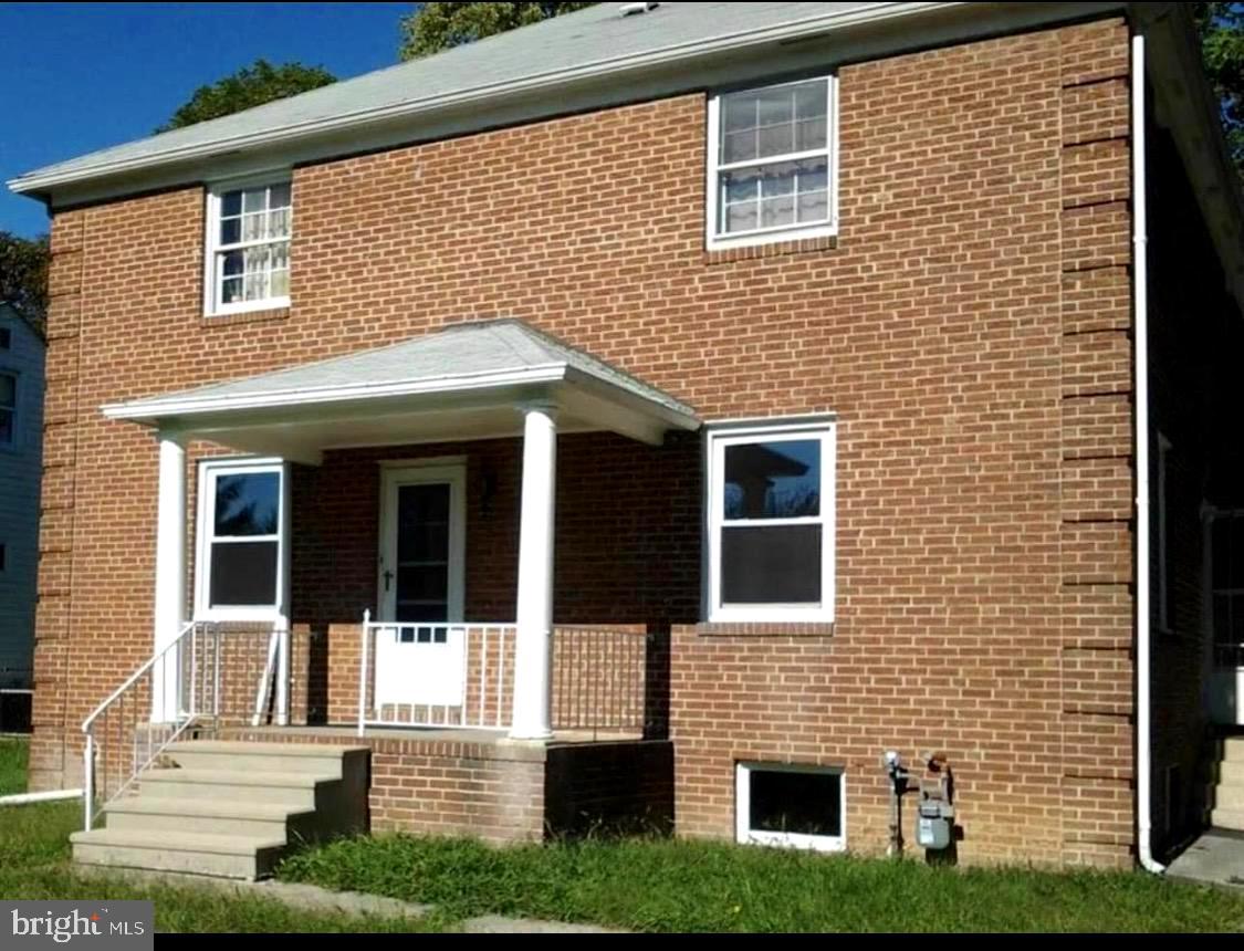 9904 Harford Road Baltimore, MD 21234 - Photo 1 of 15 a front view of a house with a yard
