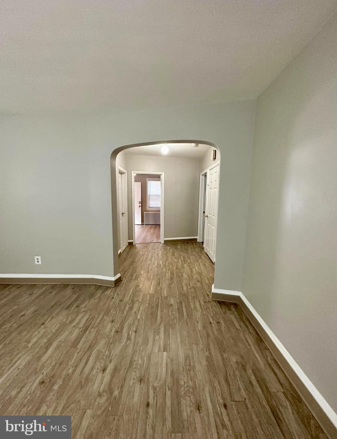9904 Harford Road Baltimore, MD 21234 - Photo 5 of 15 a view of a room with wooden floor
