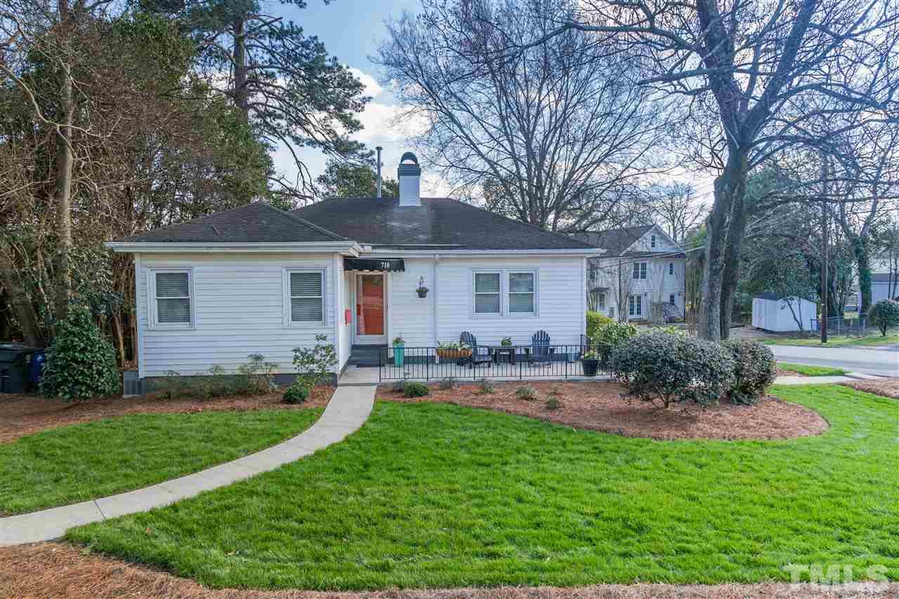 710 East Whitaker Mill Road Raleigh, NC 27608 - Photo 1 of 25 a view of a house with a yard and tree s