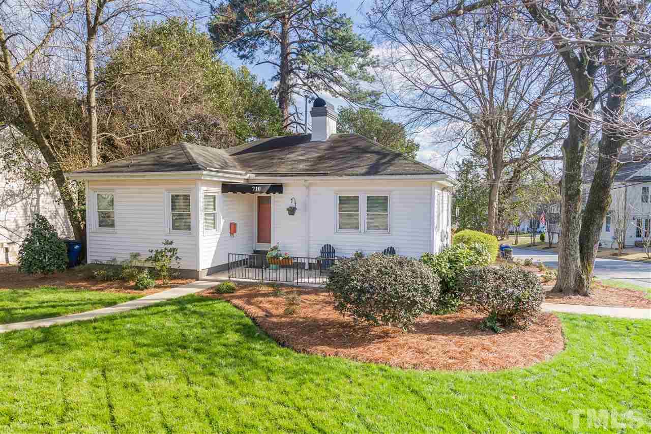710 East Whitaker Mill Road Raleigh, NC 27608 - Photo 2 of 25 a front view of house with yard and green space