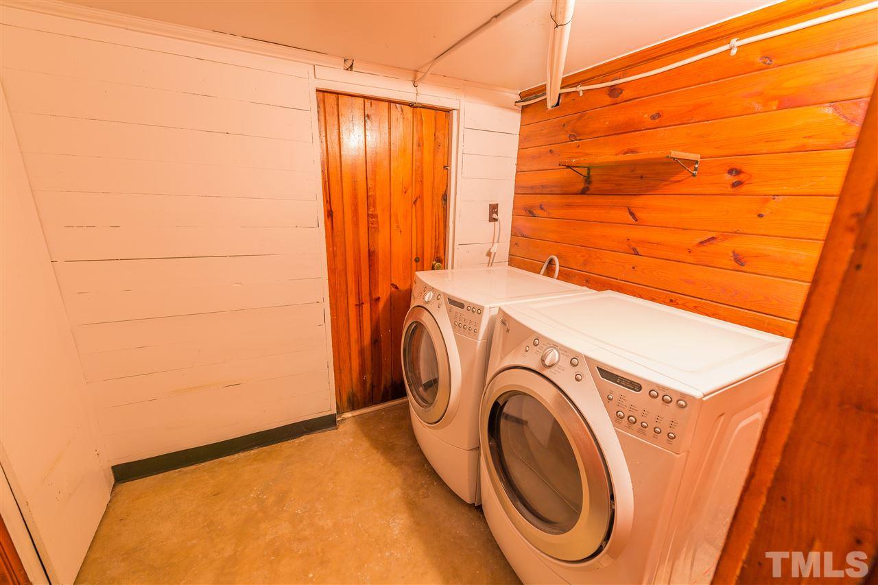 710 East Whitaker Mill Road Raleigh, NC 27608 - Photo 21 of 25 a utility room with dryer and washer