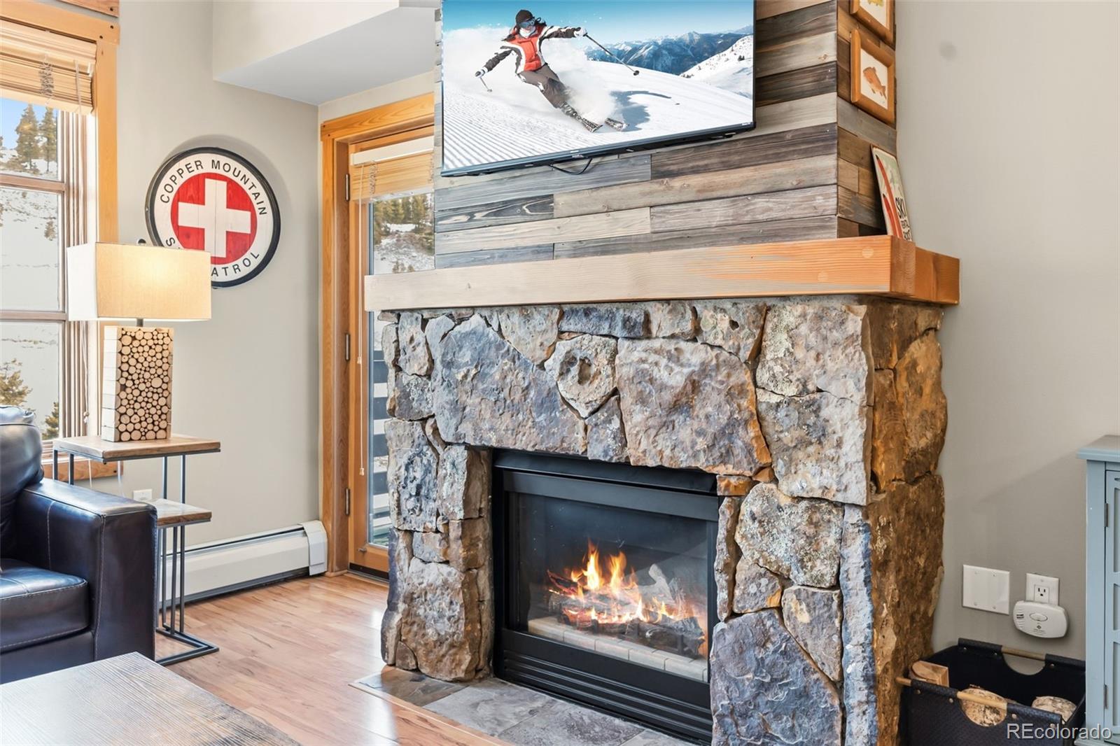 910 Copper Road, Unit 621 Frisco, CO 80443 - Photo 13 of 31 a front view of a fireplace with fan