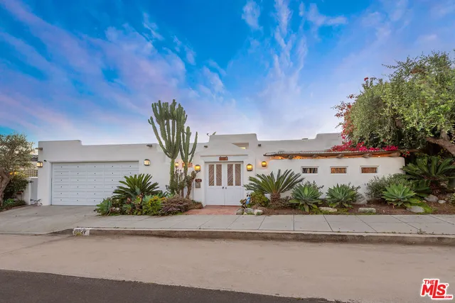 front view of a house with a street