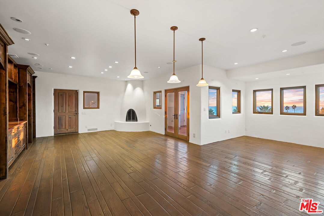 7047 Vista Del Mar Lane Playa del Rey, CA 90293 - Photo 23 of 75 a view of a kitchen with a sink refrigerator and a floor to ceiling window