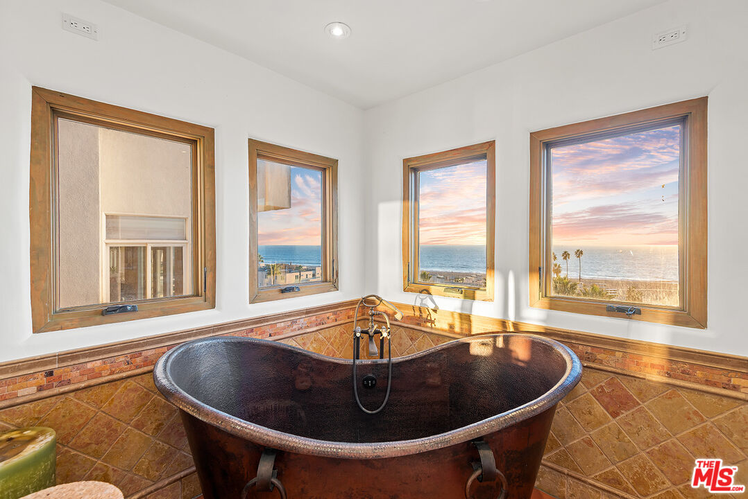 7047 Vista Del Mar Lane Playa del Rey, CA 90293 - Photo 33 of 75 a dining room with table and chairs