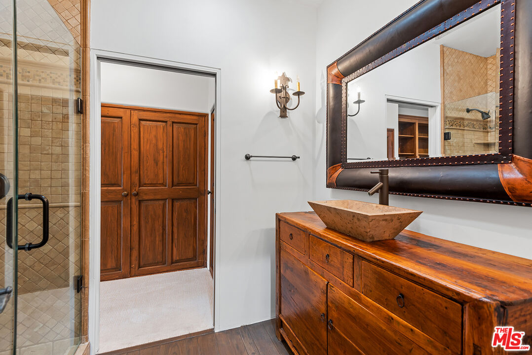 7047 Vista Del Mar Lane Playa del Rey, CA 90293 - Photo 41 of 75 a kitchen with a refrigerator and cabinets