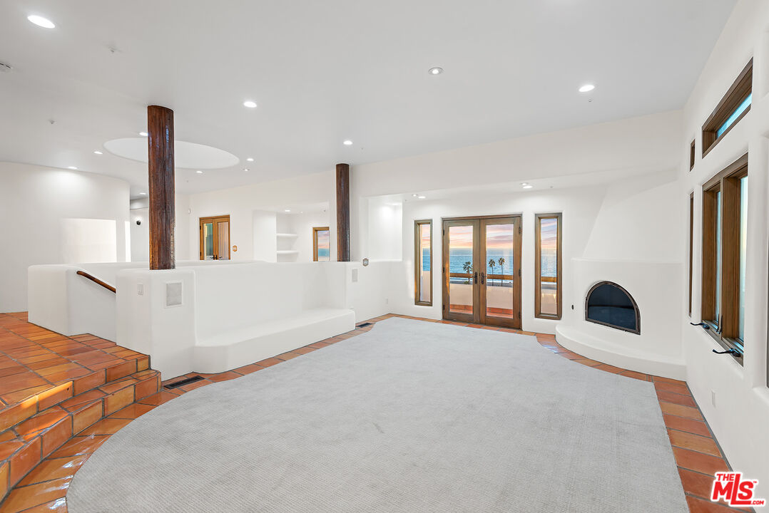 7047 Vista Del Mar Lane Playa del Rey, CA 90293 - Photo 10 of 75 a large white bed sitting in a room next to a window