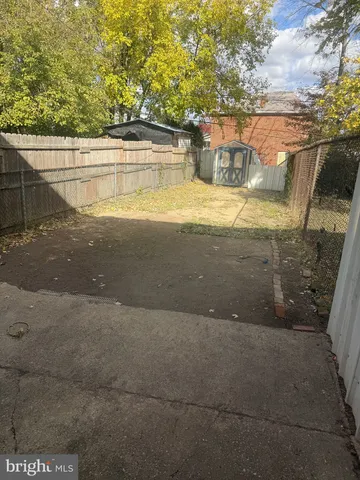 a view of a swimming pool with an outdoor space