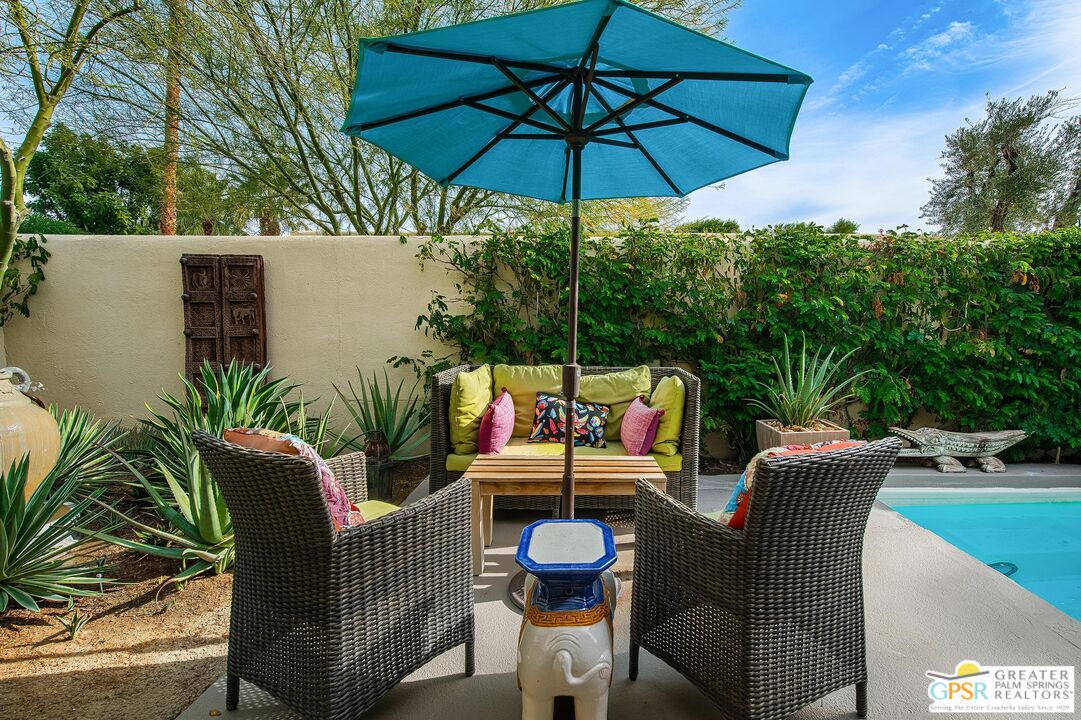 1177 East Alejo Road Palm Springs, CA 92262 - Photo 19 of 33 a view of an outdoor sitting area with furniture and backyard
