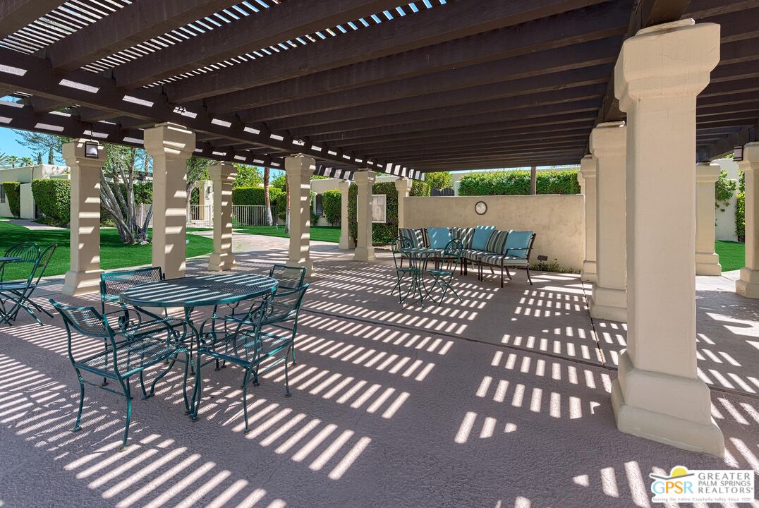 1177 East Alejo Road Palm Springs, CA 92262 - Photo 33 of 33 a patio view with a table and chairs