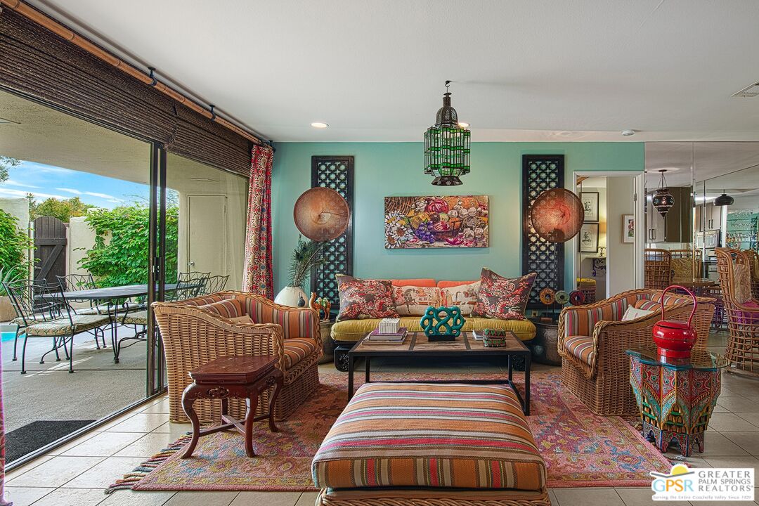 1177 East Alejo Road Palm Springs, CA 92262 - Photo 7 of 33 a living room with furniture a piano and a window