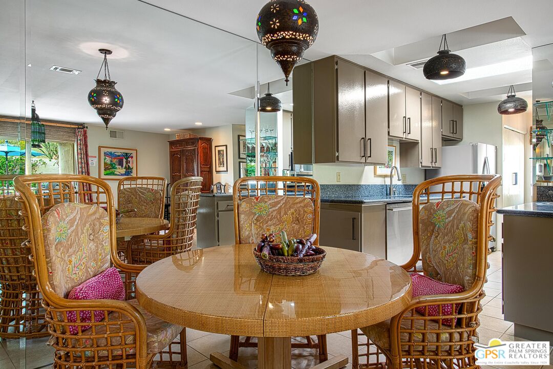 1177 East Alejo Road Palm Springs, CA 92262 - Photo 10 of 33 a view of a dining room with furniture