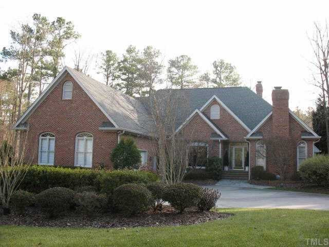 1608 Quaker Ridge Point Raleigh, NC 27615 - Photo 1 of 10 Elegant home located on the golf course of North Ridge. Exterior Front