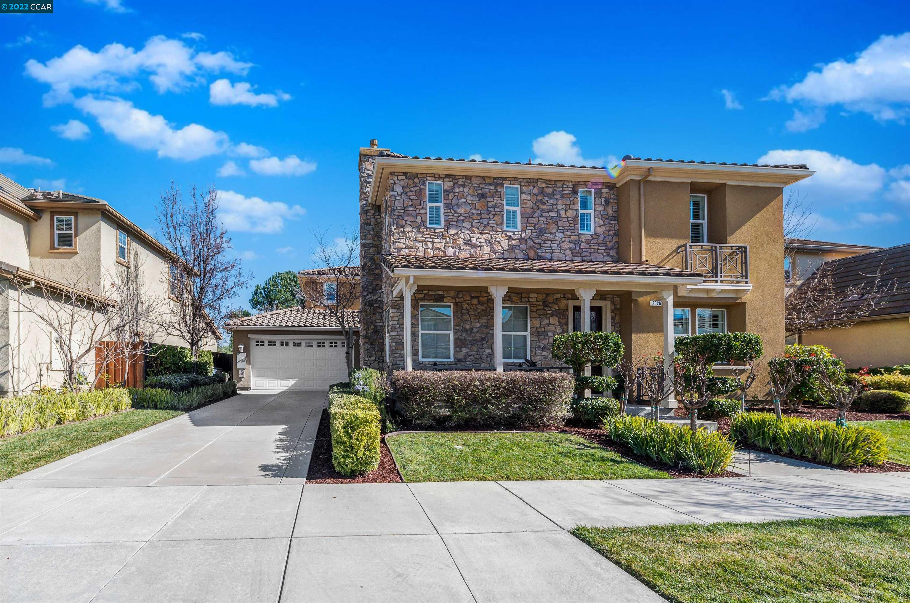 2626 Paige Way San Ramon, CA 94582 - Photo 1 of 1 a front view of a house with garden