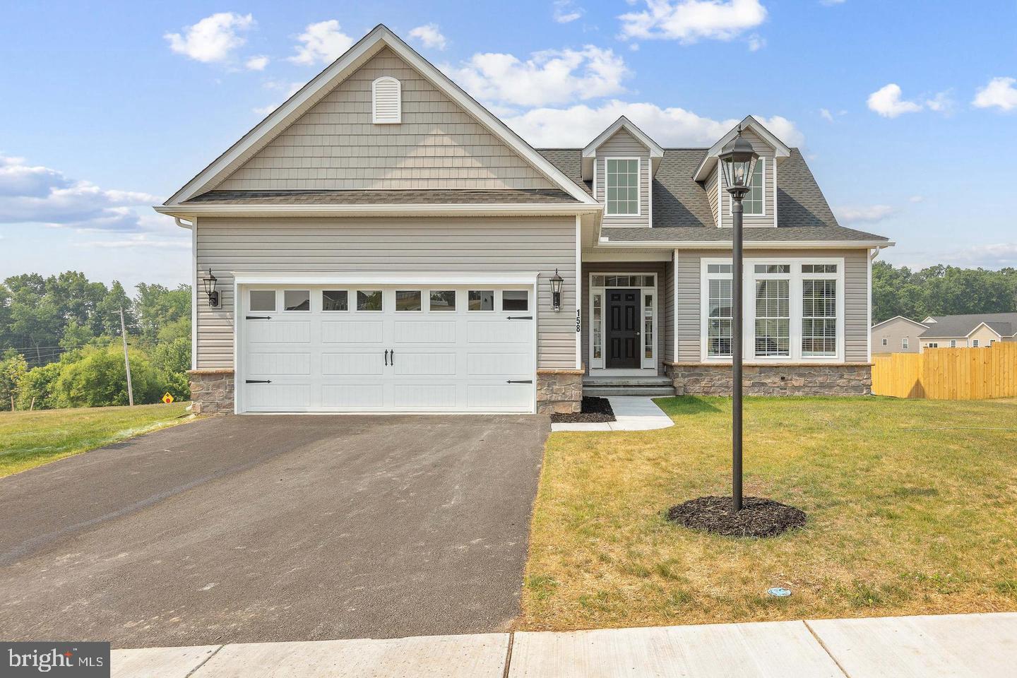 185 East Audubon Drive, Unit 177 Gettysburg, PA 17325 - Photo 1 of 36 a front view of a house with a yard