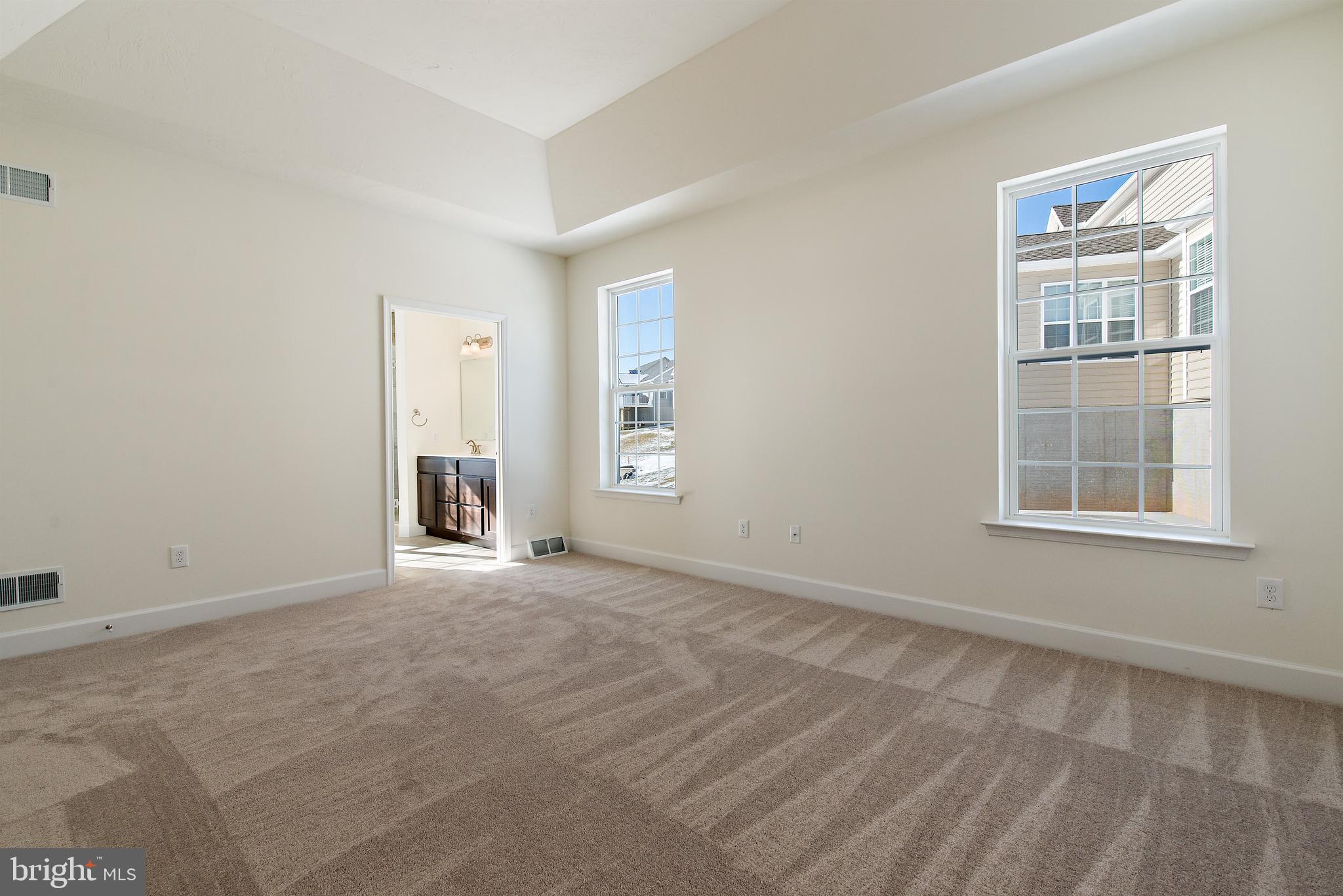 185 East Audubon Drive, Unit 177 Gettysburg, PA 17325 - Photo 18 of 36 an empty room with windows
