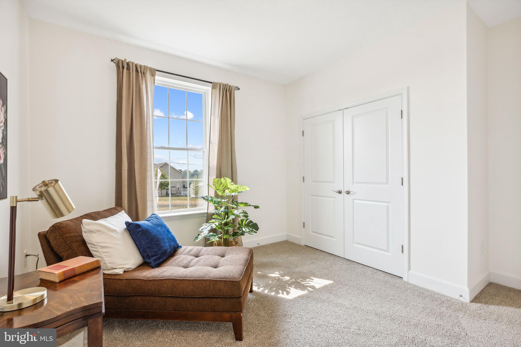 185 East Audubon Drive, Unit 177 Gettysburg, PA 17325 - Photo 32 of 36 a living room with furniture and a large window