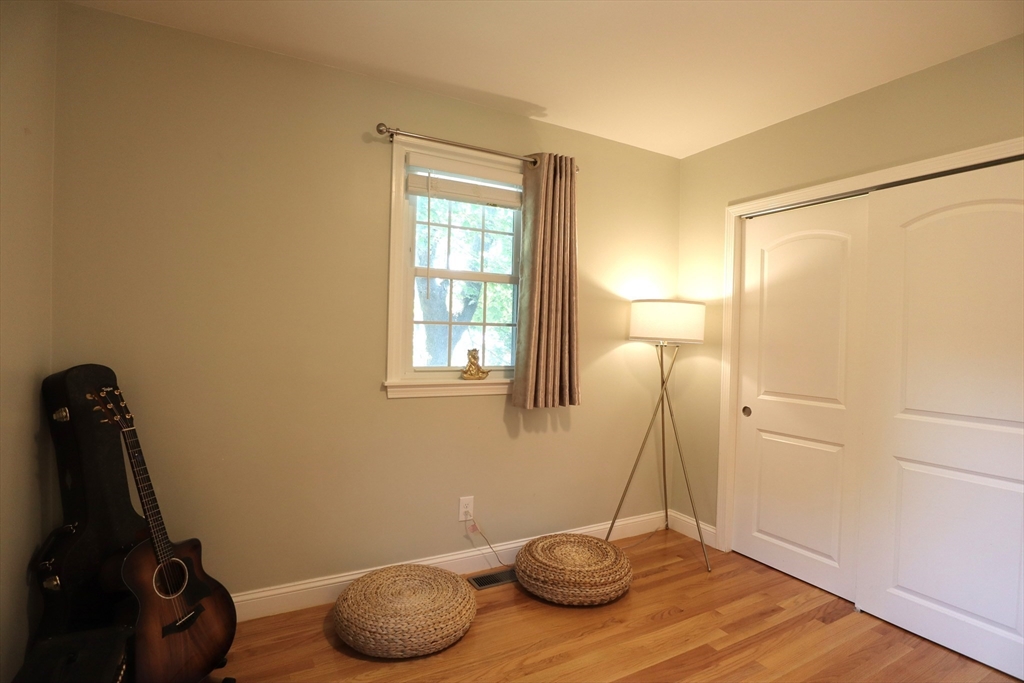 838 Worcester Street Wellesley, MA 02482 - Photo 24 of 42 a view of a livingroom with furniture and wooden floor