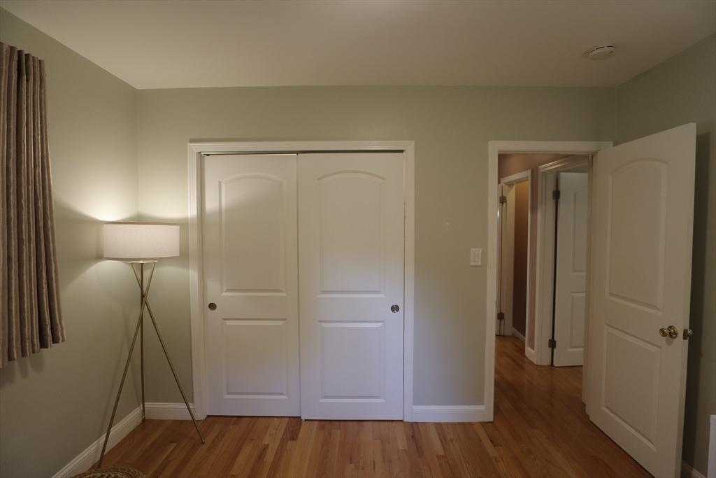838 Worcester Street Wellesley, MA 02482 - Photo 25 of 42 a view of a room with wooden floor