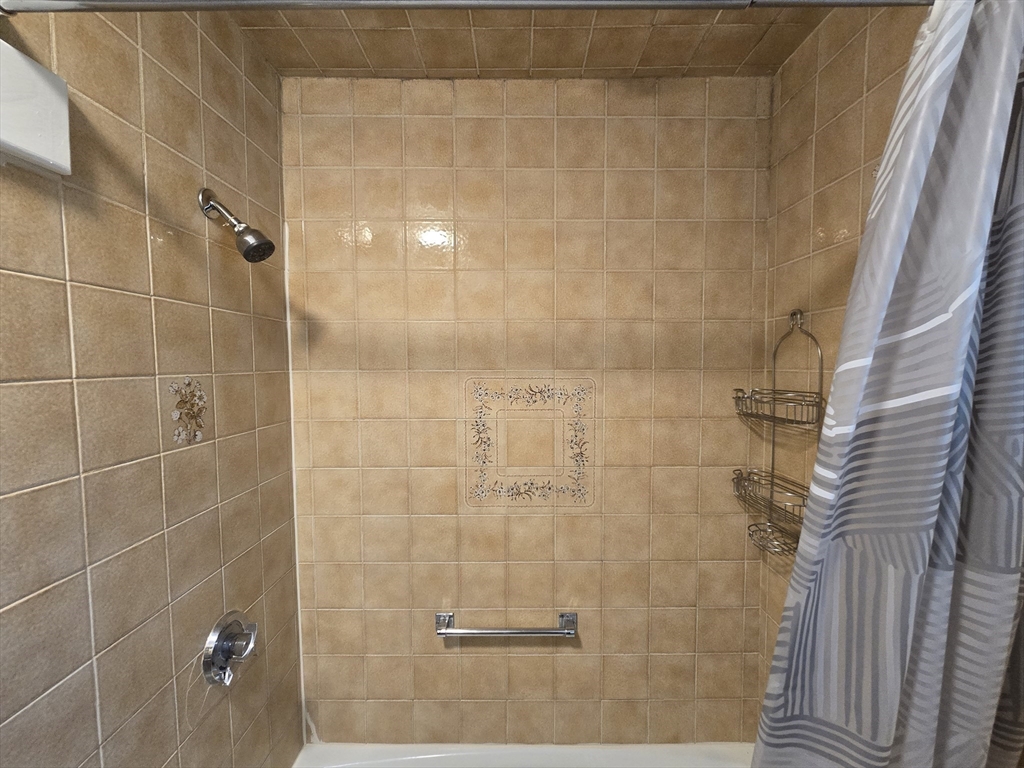 838 Worcester Street Wellesley, MA 02482 - Photo 29 of 42 a bathroom with a shower