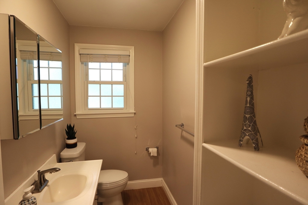 838 Worcester Street Wellesley, MA 02482 - Photo 31 of 42 a bathroom with a sink and toilet