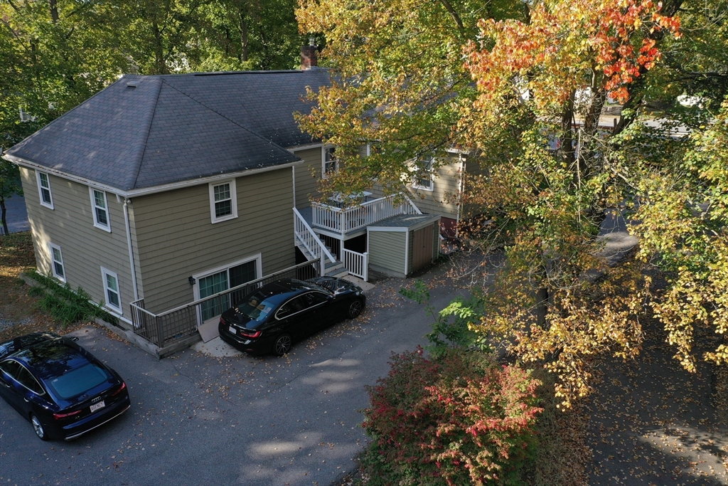 838 Worcester Street Wellesley, MA 02482 - Photo 41 of 42 a car parked in front of a house