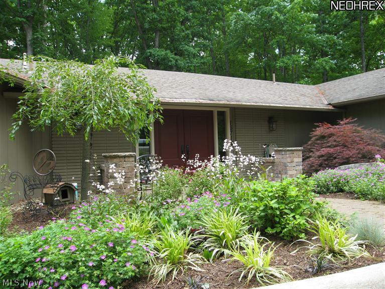Enjoy the beautiful landscaping surrounding this home.  From a double door entry to the decks in the back. Privacy and elegance is assured.