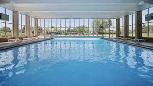 a view of swimming pool with outdoor seating