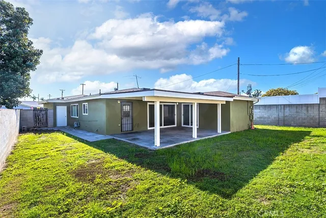 a view of a house with a swimming pool
