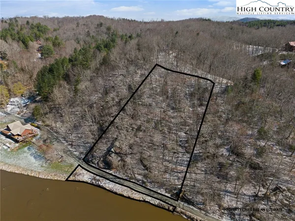 $100,000 | Lot 7-8 Happy Hunt Drive, Grassy Creek, NC 28631