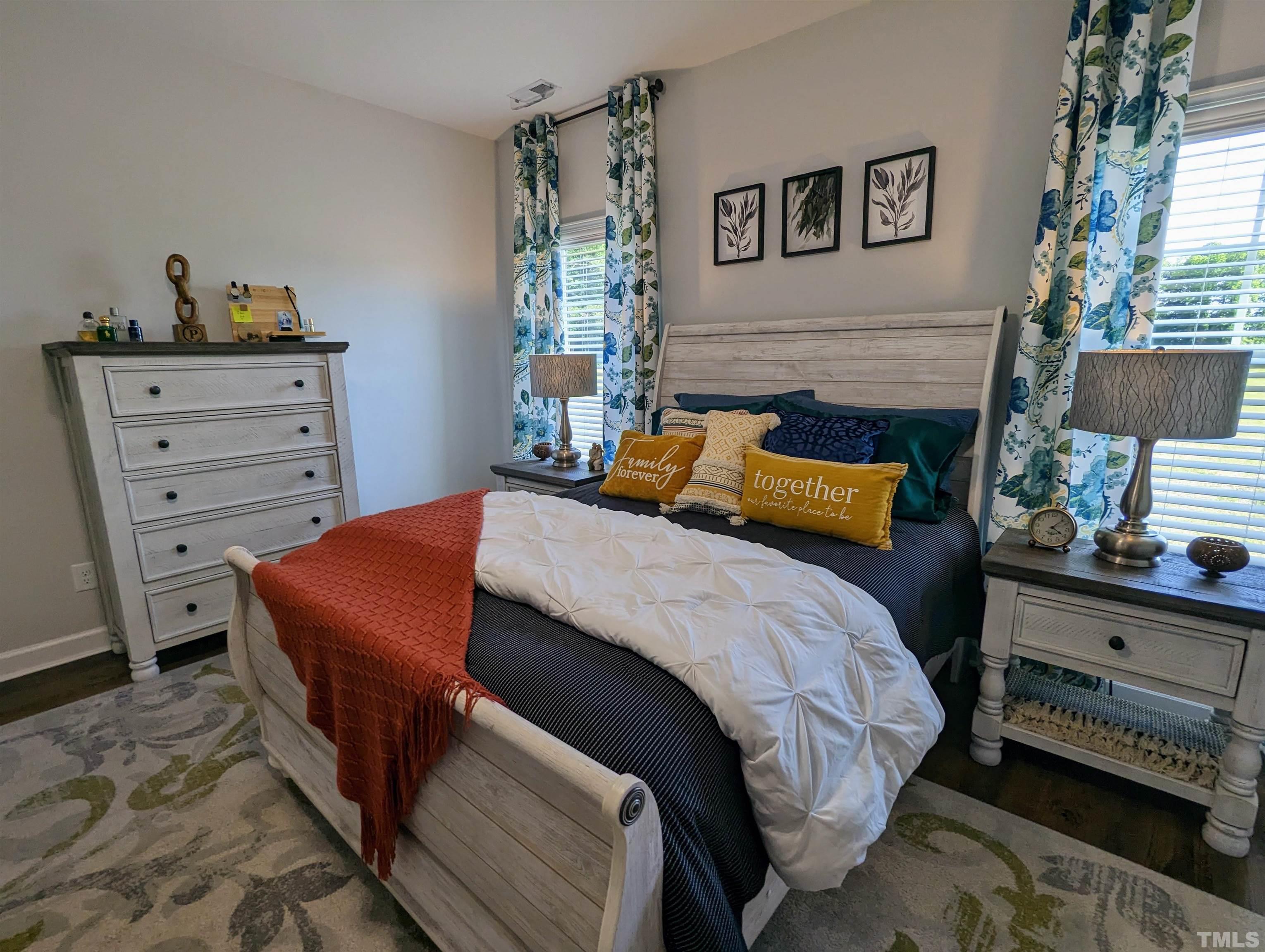 630 Ballance Road Fremont, NC 27830 - Photo 12 of 35 a bedroom with a bed and a couch