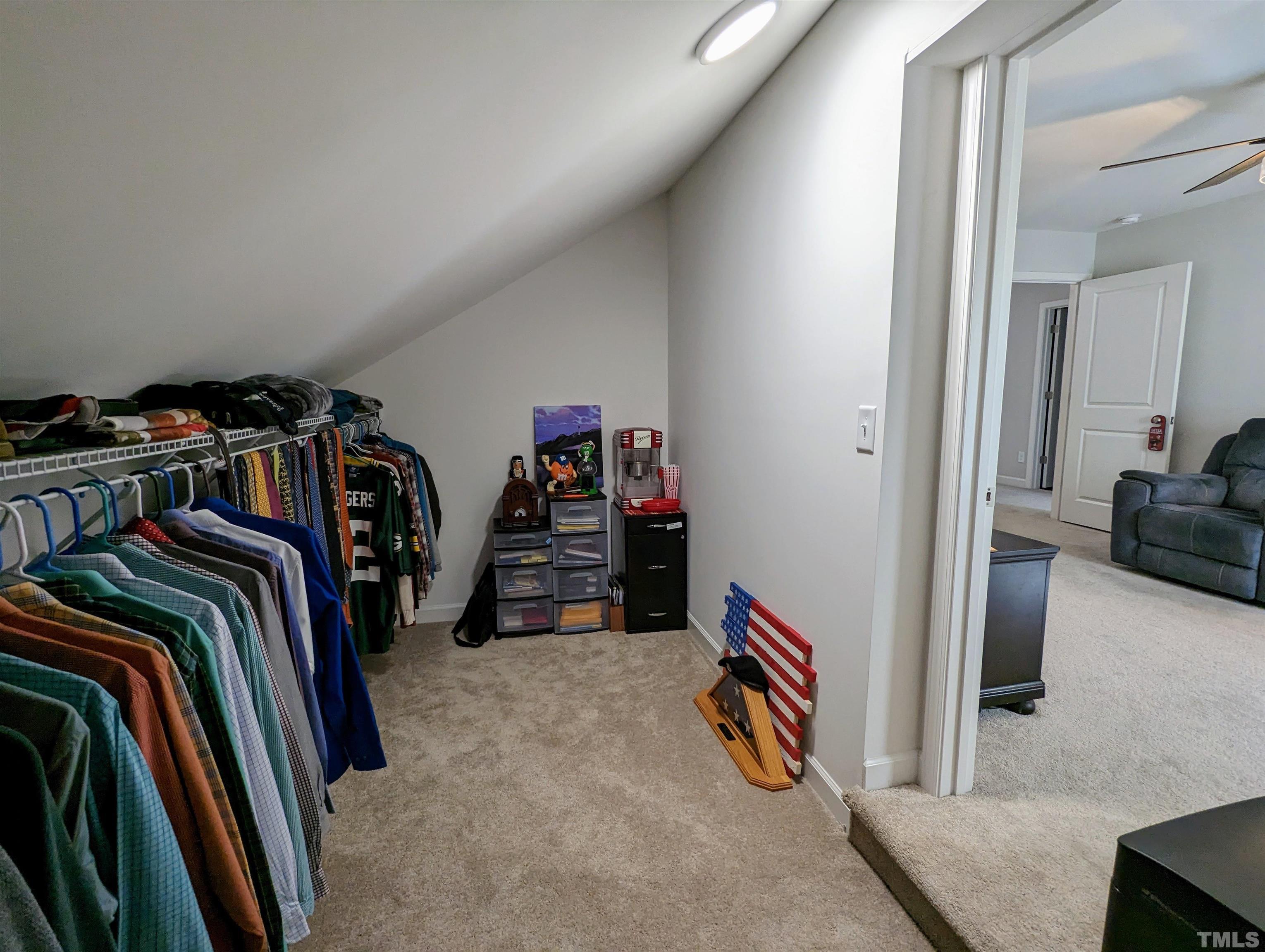 630 Ballance Road Fremont, NC 27830 - Photo 28 of 35 a view of walk in closet with clothes and shoes