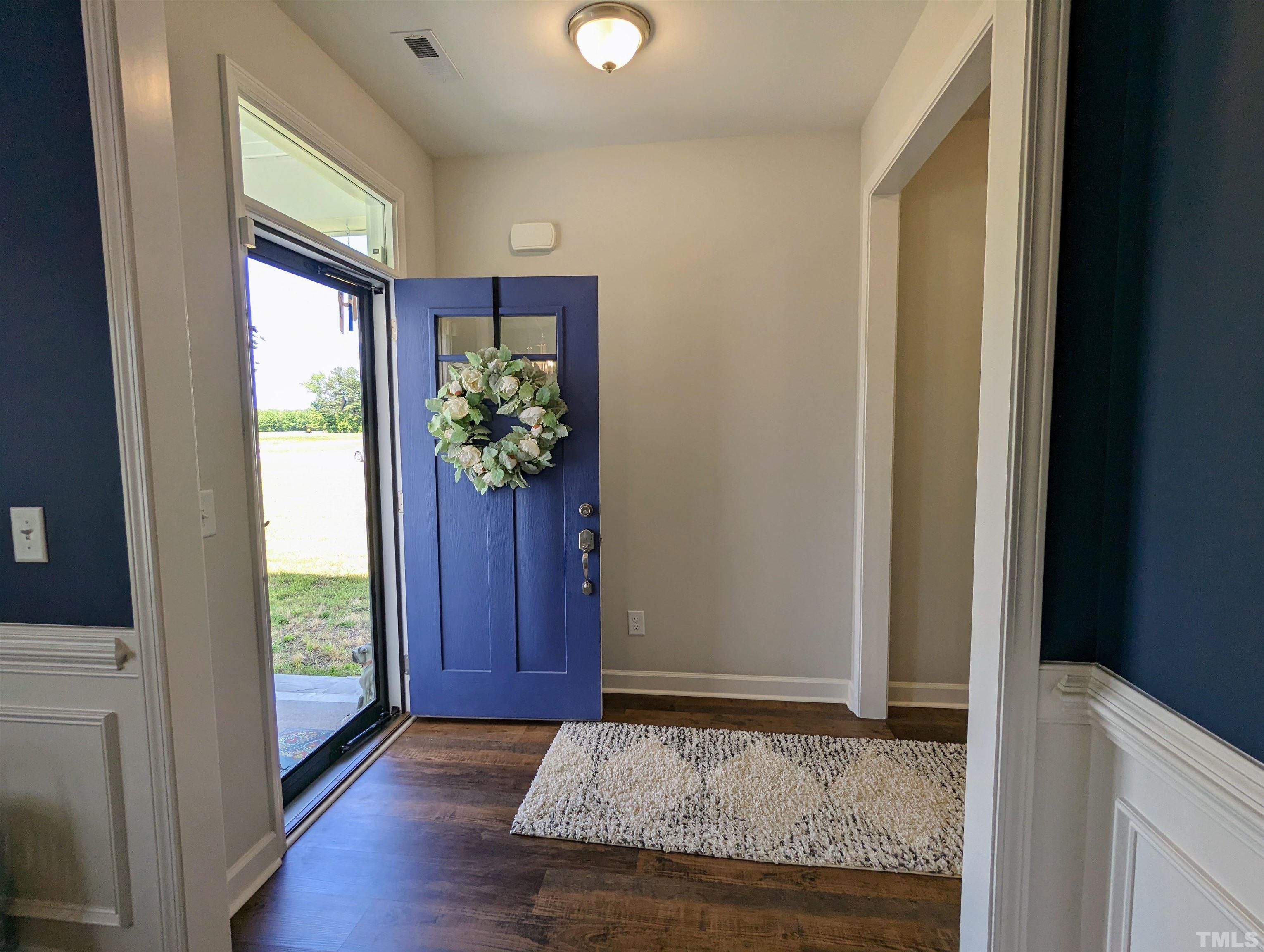 630 Ballance Road Fremont, NC 27830 - Photo 3 of 35 a view of entryway with wooden floor