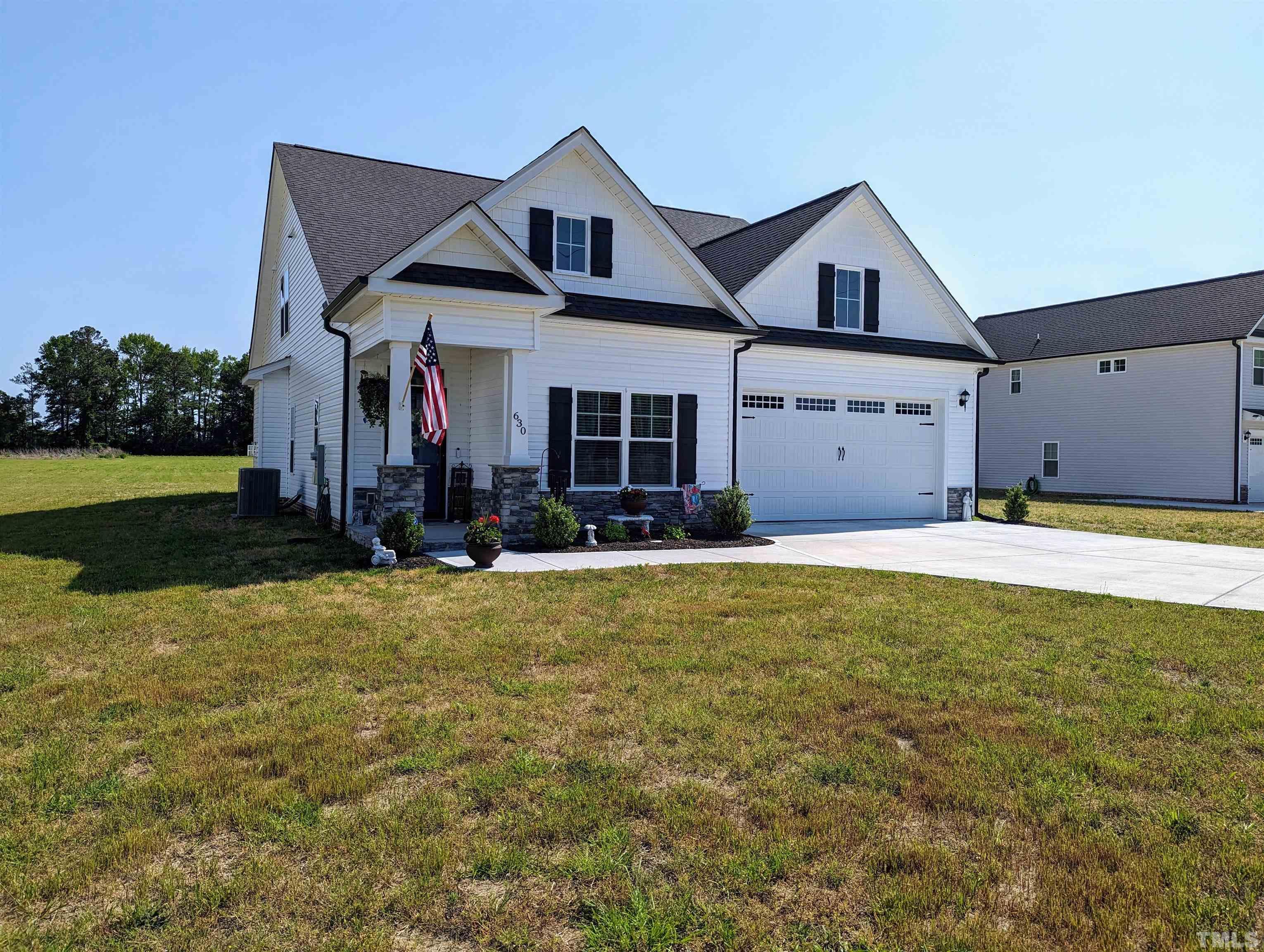 630 Ballance Road Fremont, NC 27830 - Photo 34 of 35 a front view of a house with a yard