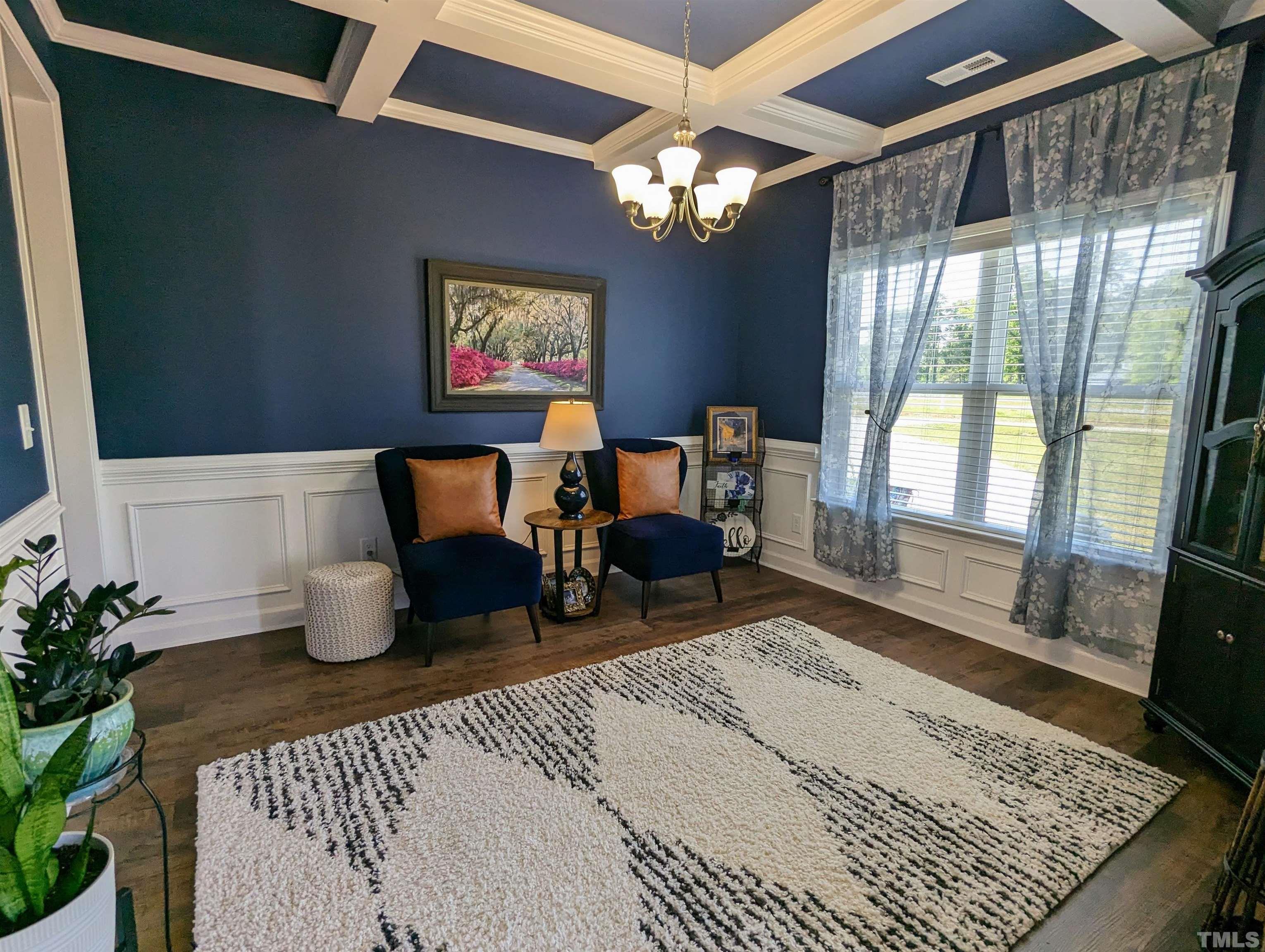 630 Ballance Road Fremont, NC 27830 - Photo 4 of 35 a living room with furniture and a chandelier