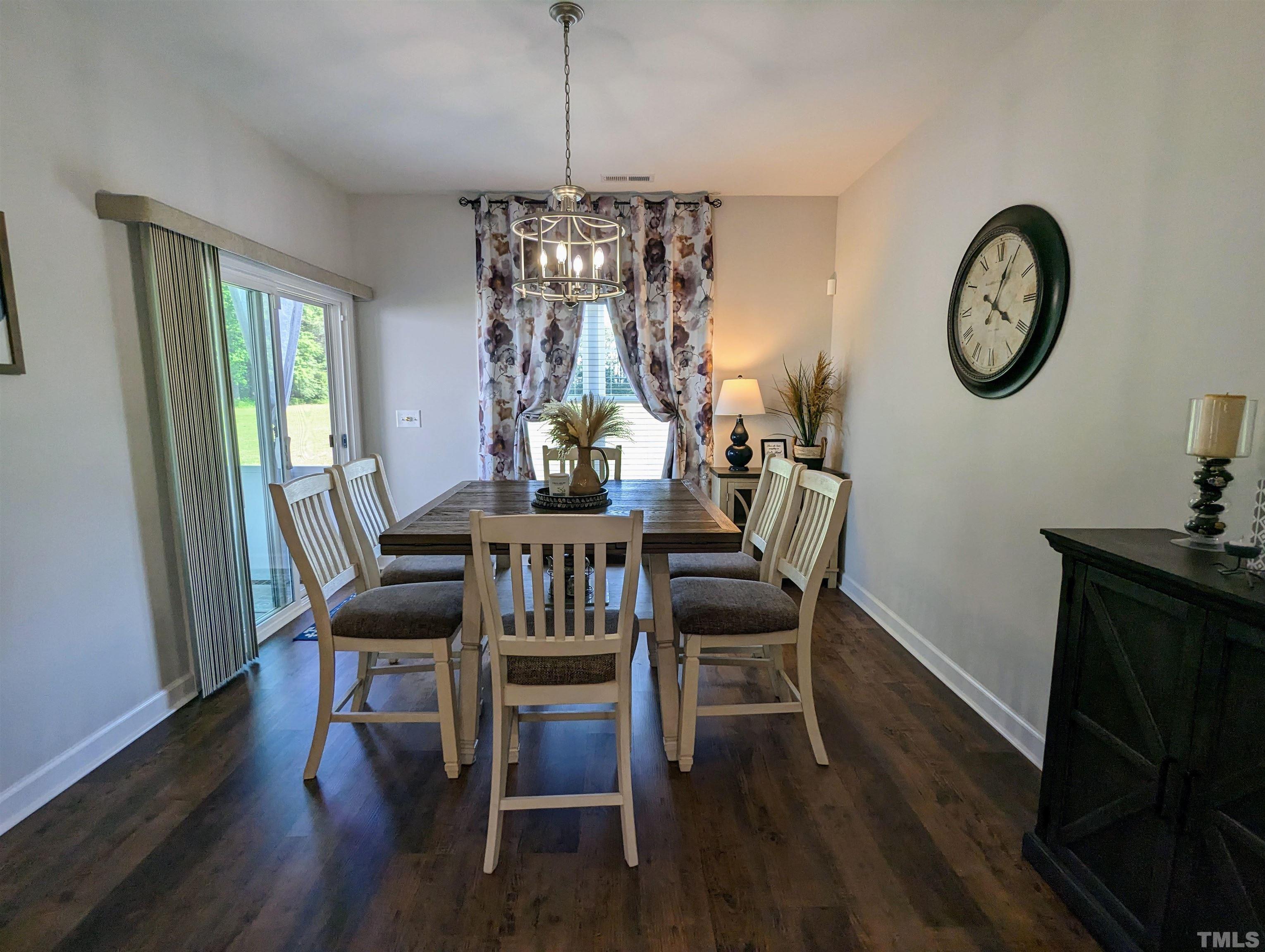 630 Ballance Road Fremont, NC 27830 - Photo 9 of 35 a view of a dining room with furniture window and wooden floor