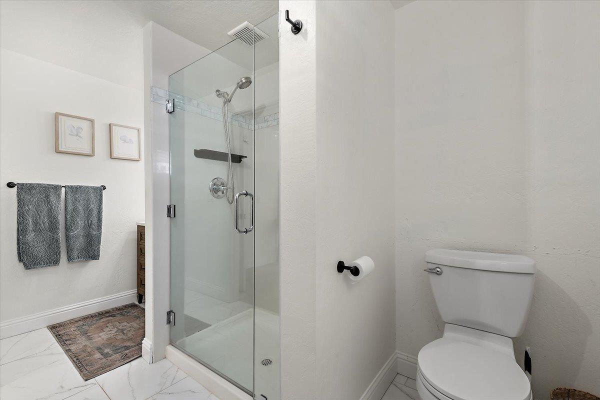 789 Cañada Road Woodside, CA 94062 - Photo 19 of 33 a bathroom with a toilet and a shower