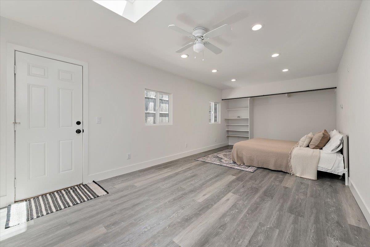 789 Cañada Road Woodside, CA 94062 - Photo 24 of 33 a spacious bedroom with a bed and a window
