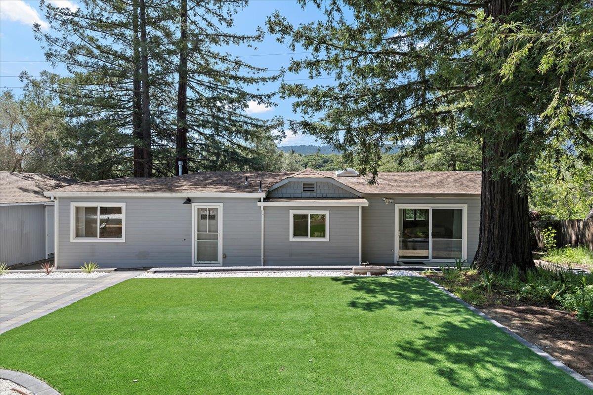 789 Cañada Road Woodside, CA 94062 - Photo 32 of 33 a front view of house with yard and green space