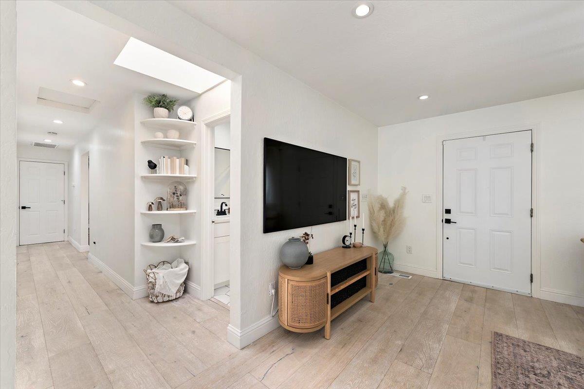 789 Cañada Road Woodside, CA 94062 - Photo 4 of 33 a living room with furniture and a flat screen tv