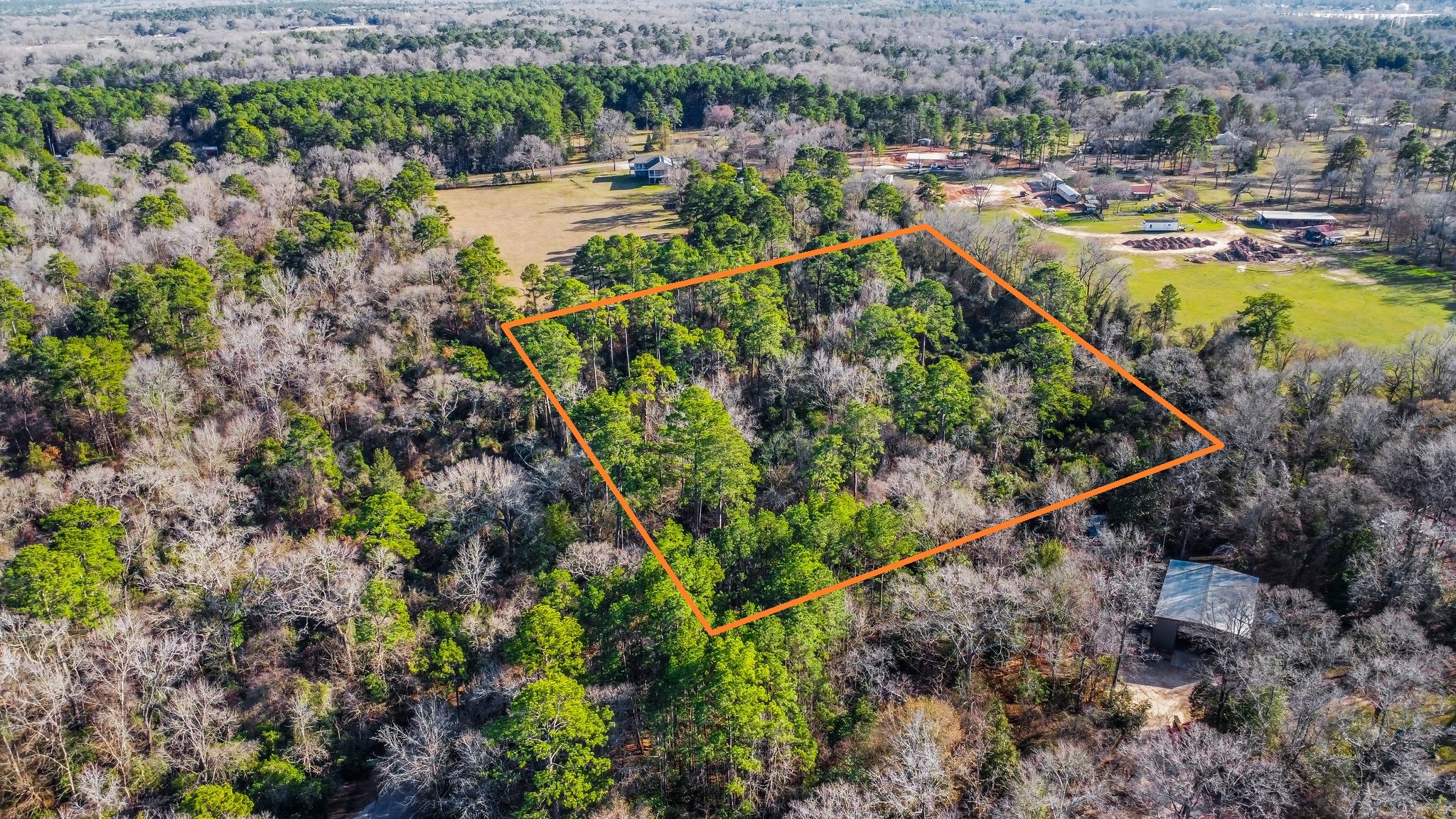 Tbd Copperhead Road Conroe, TX 77303 - Photo 11 of 21 a view of a lake with a park