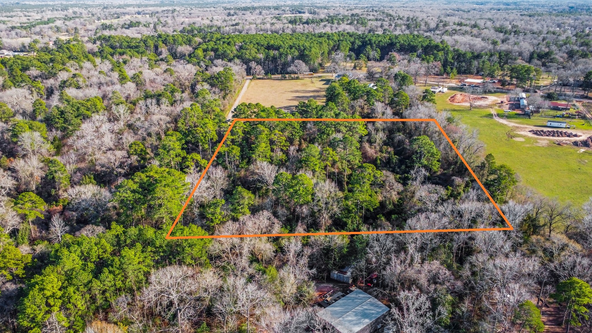 Tbd Copperhead Road Conroe, TX 77303 - Photo 12 of 21 a view of a lake with large trees