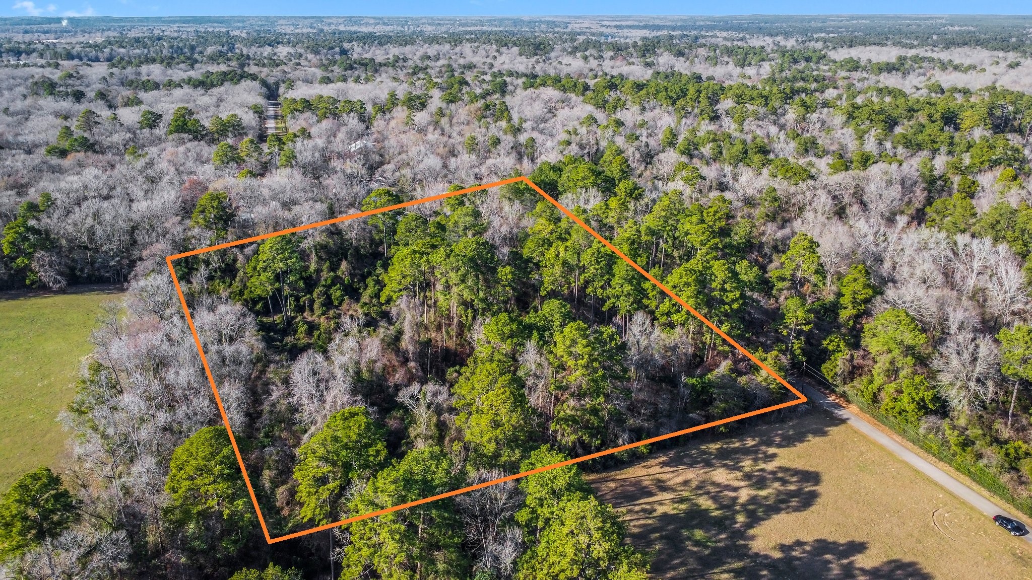 Tbd Copperhead Road Conroe, TX 77303 - Photo 5 of 21 an aerial view of residential houses with outdoor space and trees