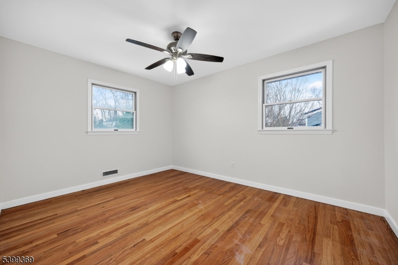 707 Warfield Road North Plainfield, NJ 07063 - Photo 18 of 28 a view of empty room with wooden floor