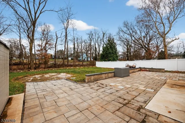 a view of a yard with trees