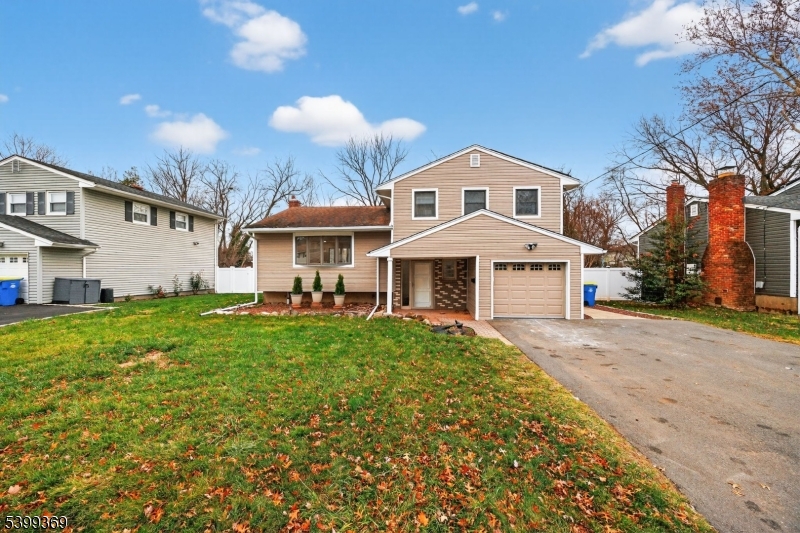 707 Warfield Road North Plainfield, NJ 07063 - Photo 4 of 28 a front view of a house with a yard