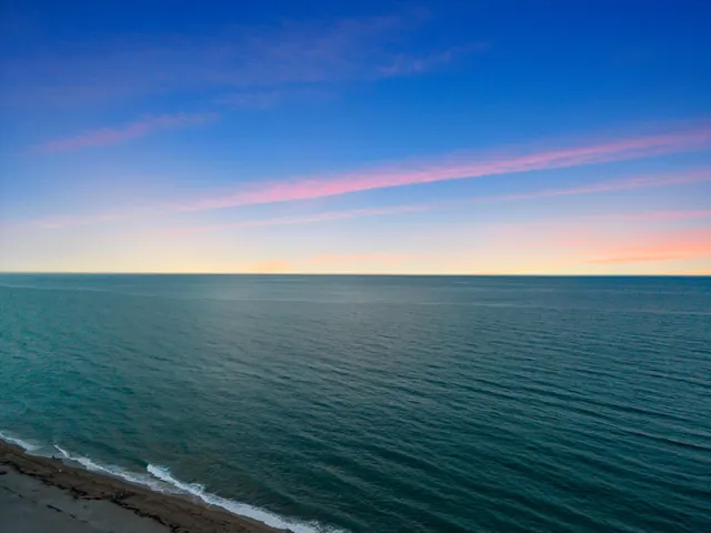 a view of beach and ocean